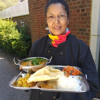 Amy with dish of day